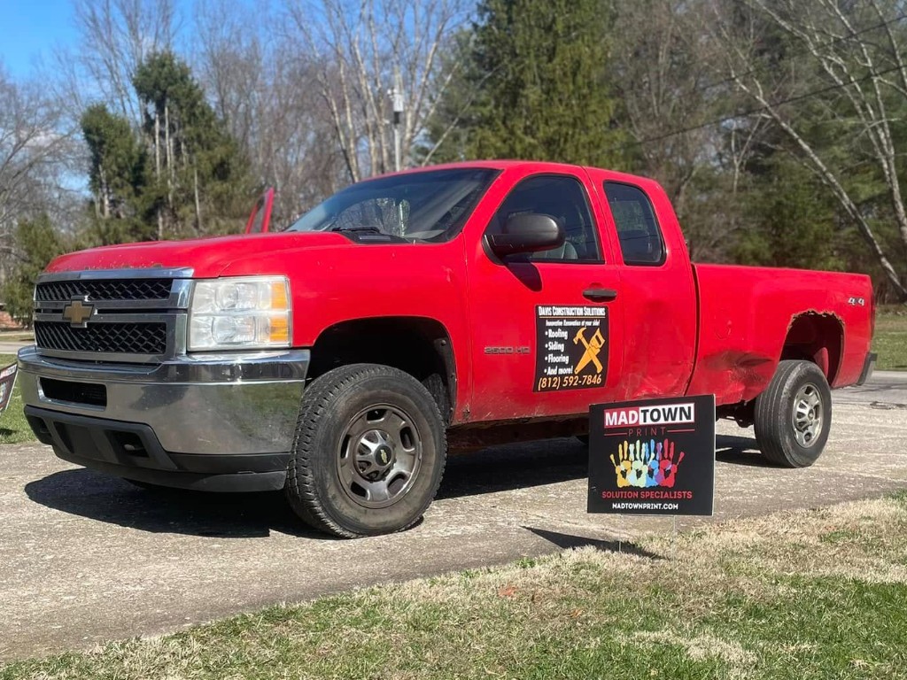 Job-site yard sign and truck branding
